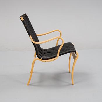 A 'Mina' armchair by Bruno Mathsson for Mathsson International.