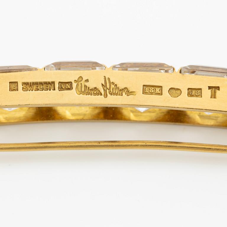 Wiwen Nilsson, a brooch, 18K gold with faceted rock crystal, Lund 1942.