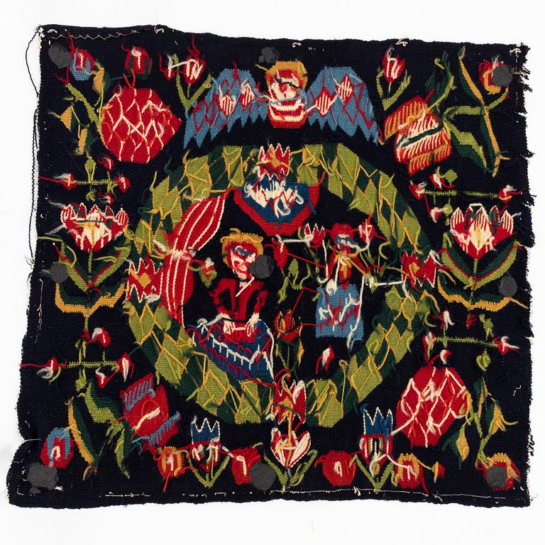 A carrige cushion, "Bebådelsen", tapestry weave, ca 47 x 48 cm, Skåne, 19th century.