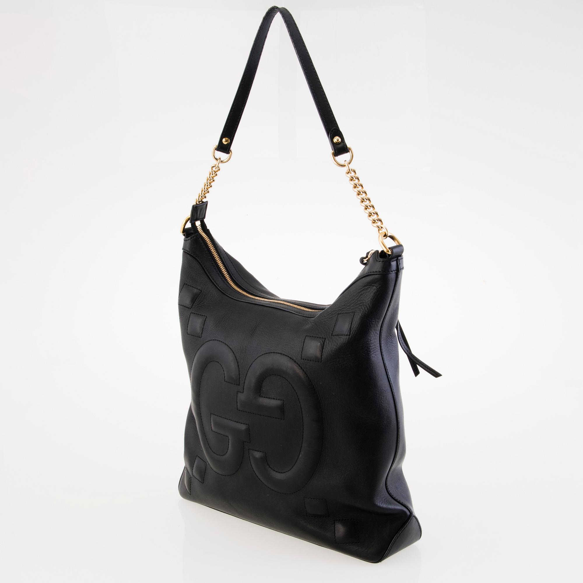 GUCCI Apollo Embossed GG Black Leather Shoulder Bag.