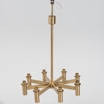 Hans-Agne Jakobsson, an eight-light brass ceiling light from Markaryd, Sweden.