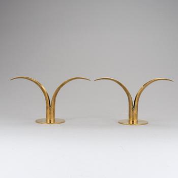 IVAR Alenius-Bjork, a pair of candlesticks, brass, "Lily, Ystad Metall. The model designed in 1939.