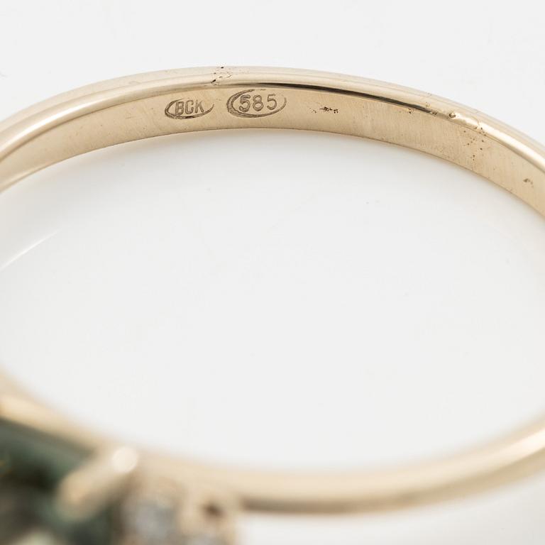 Ring in 14K white gold with tourmaline and brilliant-cut diamonds.