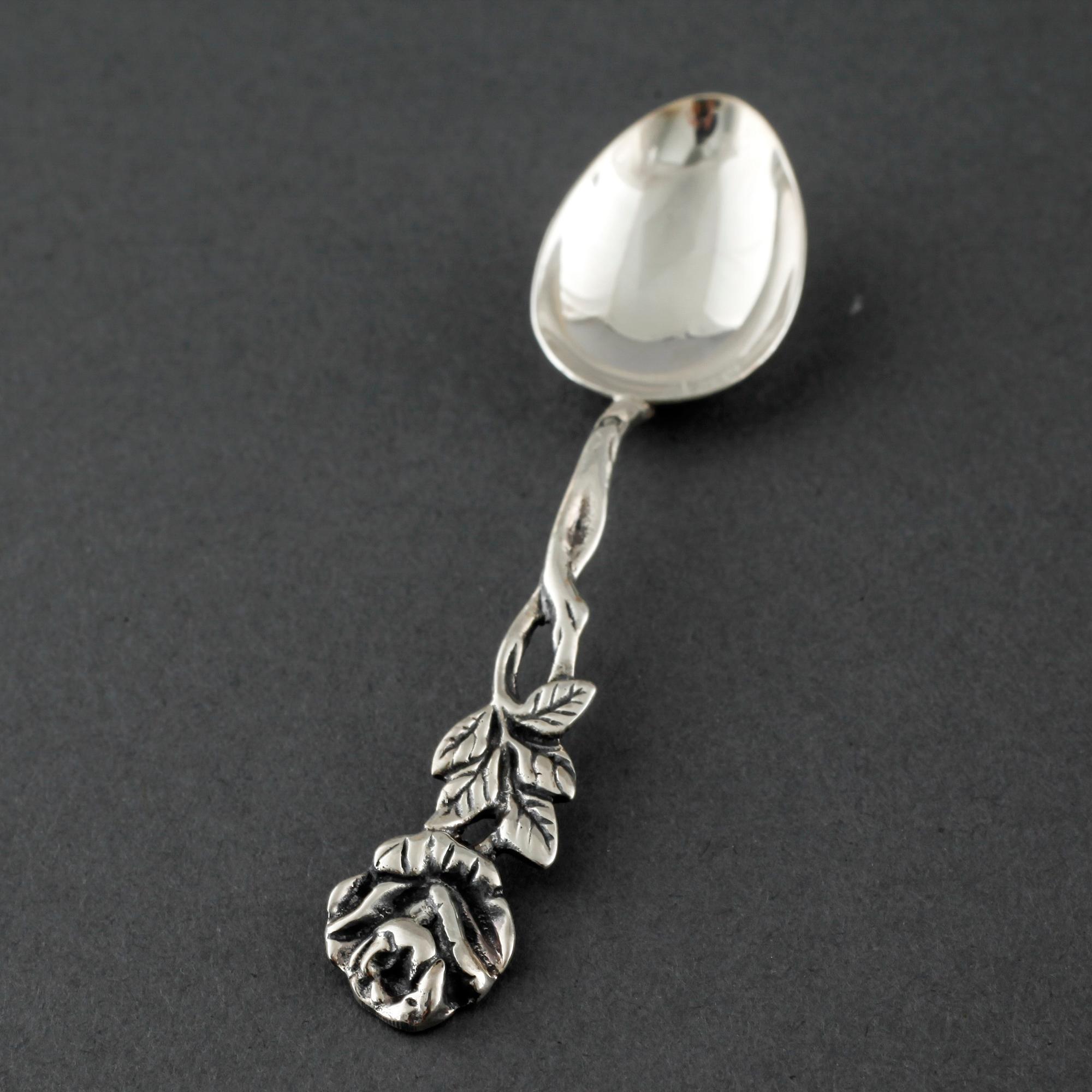 22 swedish silver spoons and one ladle, from the 19th and 20th century.