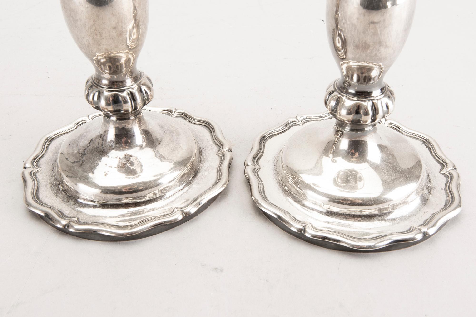 A pair of Austrian silver candle sticks Vienna 1852 weight 626 gr.
