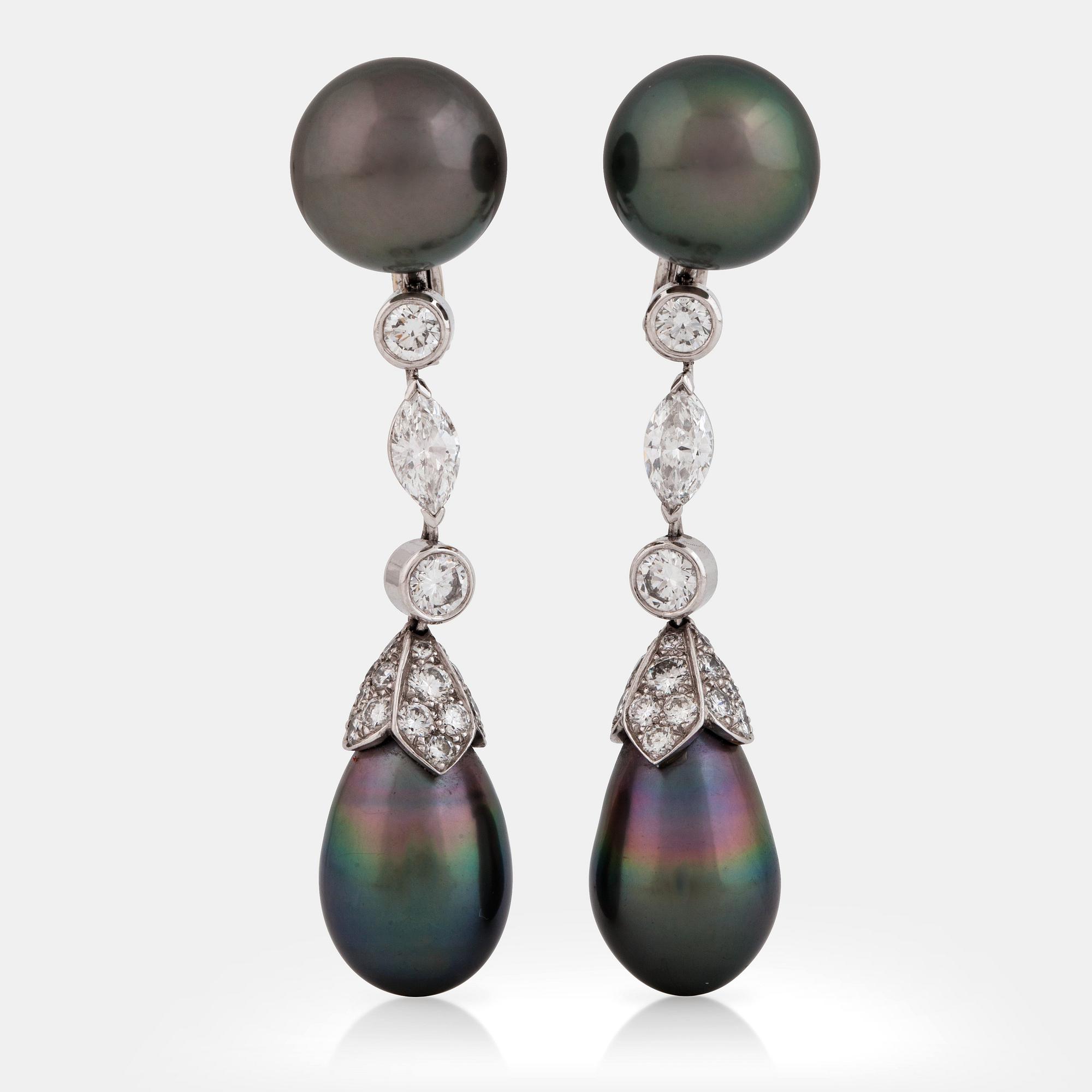 A pair of cultured Tahiti and diamond earrings signed Cartier. Total carat weight of diamonds circa 3.20 cts.