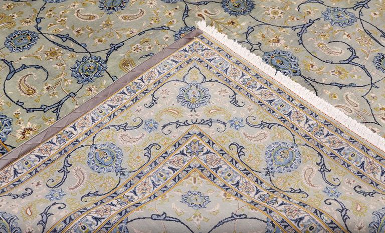 A Royal Keshan carpet, signed, 410 x 307 cm.