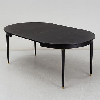 A Gustavian style painted dining table, second half of the 20th century.