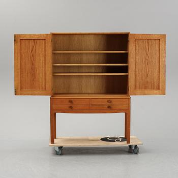 Carl Malmsten, a 'October' cabinet from the second half of the 20th century.