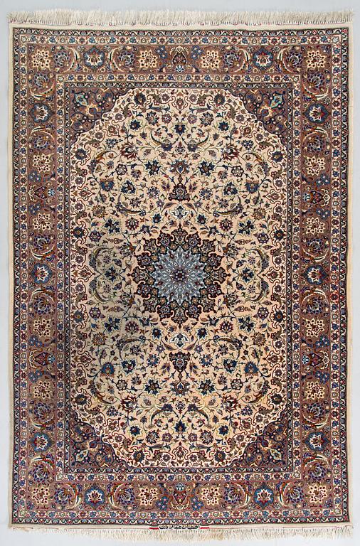A semi-antique Isfahan rug, central Persia, signed c. 238 x 165 cm.