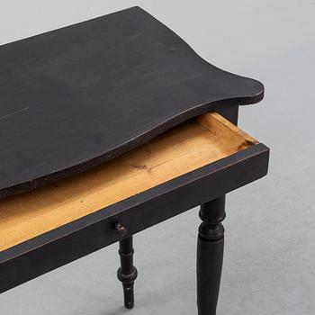 A painted pine table, second half of the 20th Century.
