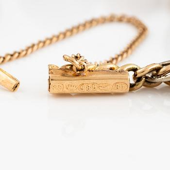 Bracelet with charms in the shape of eggs, the bracelet is 14K gold and 13 loose charms in the shape of eggs.