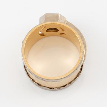 Ring, 18K gold with hexagonally faceted diamond.