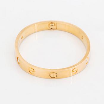 A Cartier bracelet "Love" in 18K gold set with round brilliant-cut diamonds.