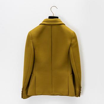 Prada, an olive green scuba jacket.