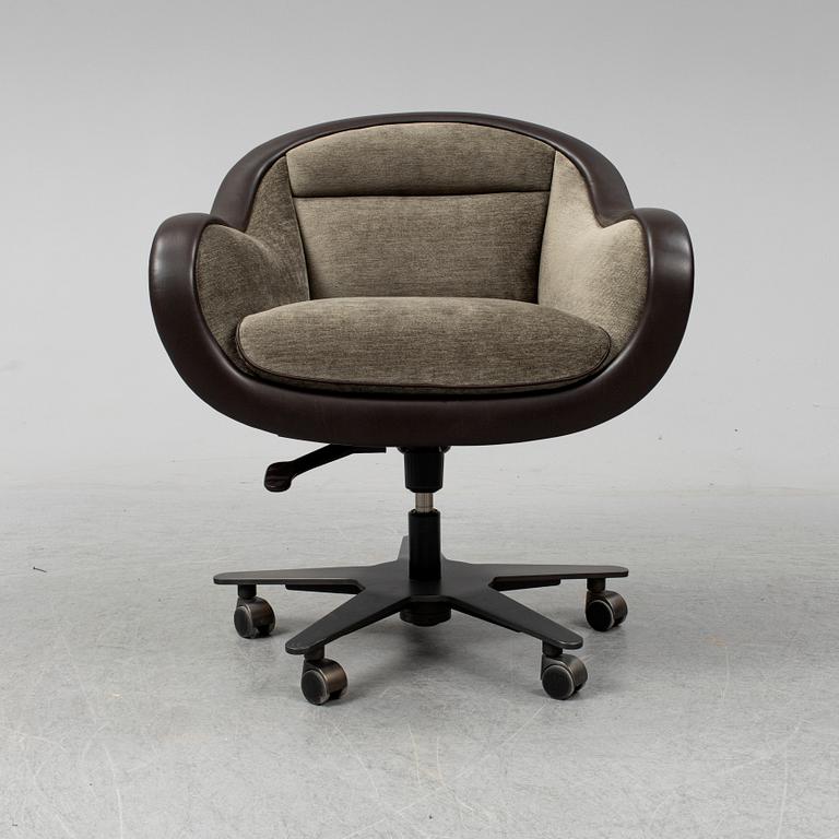 An contemporary 'Vittoria' office chair by Romeo Sozzi for Promemoria furniture.