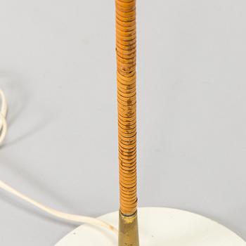 Paavo Tynell, a pair of mid-20th century K10-10 floor lamps for Taito Finland.
