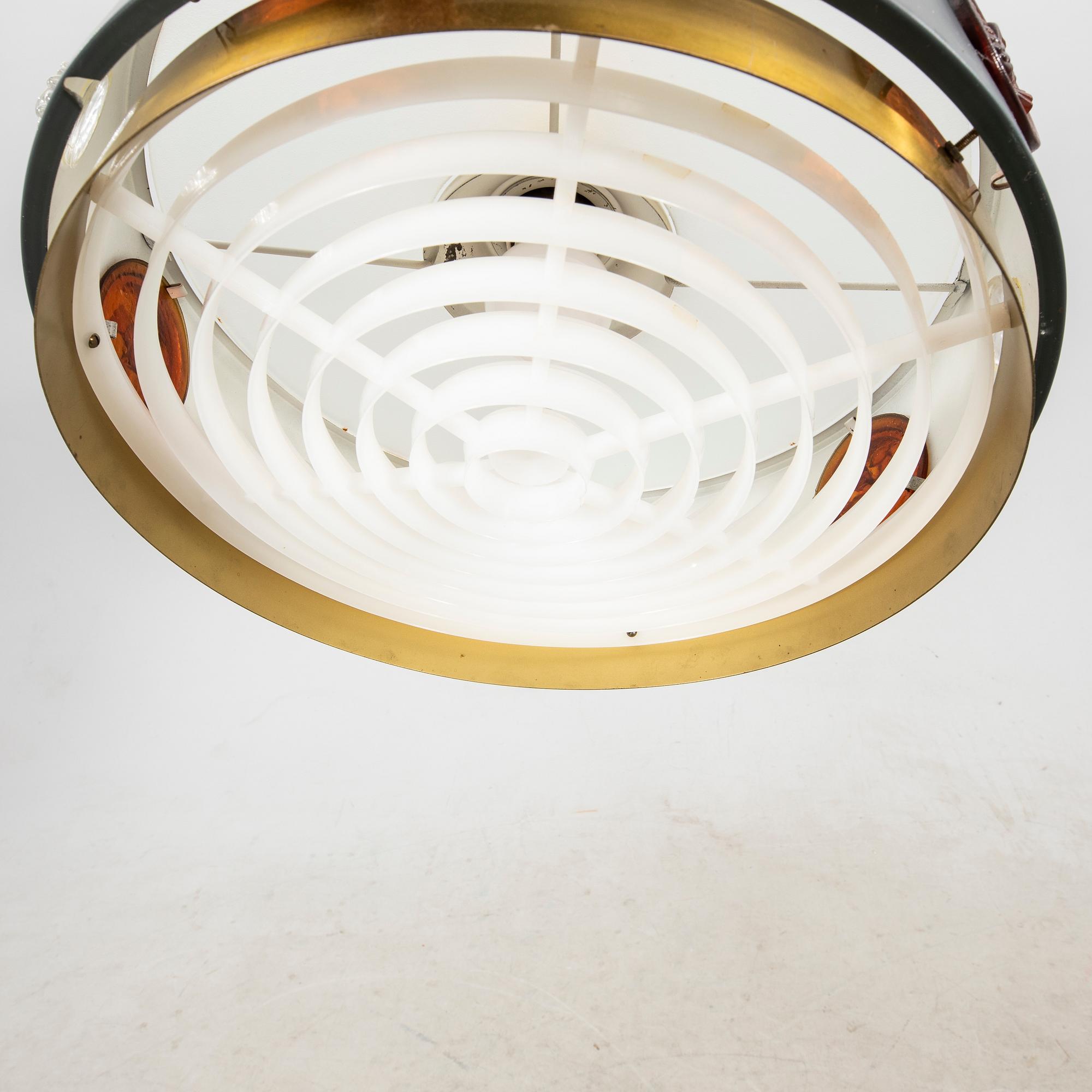 A brass, metal and glass ceiling lamp by Einar Bäckström, Malmö second half of the 20th century.