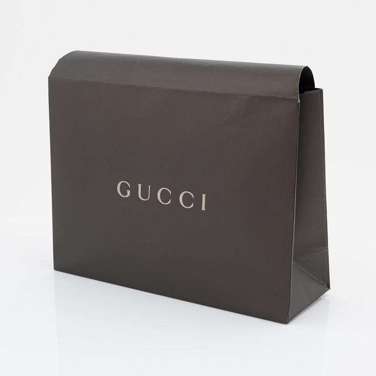 Gucci, a monogram canvas beret, size S.