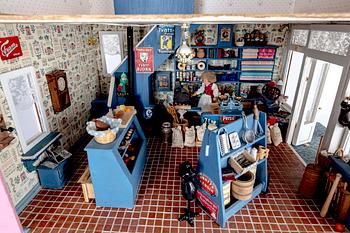 A handmade dolls house later part of the 20th century.