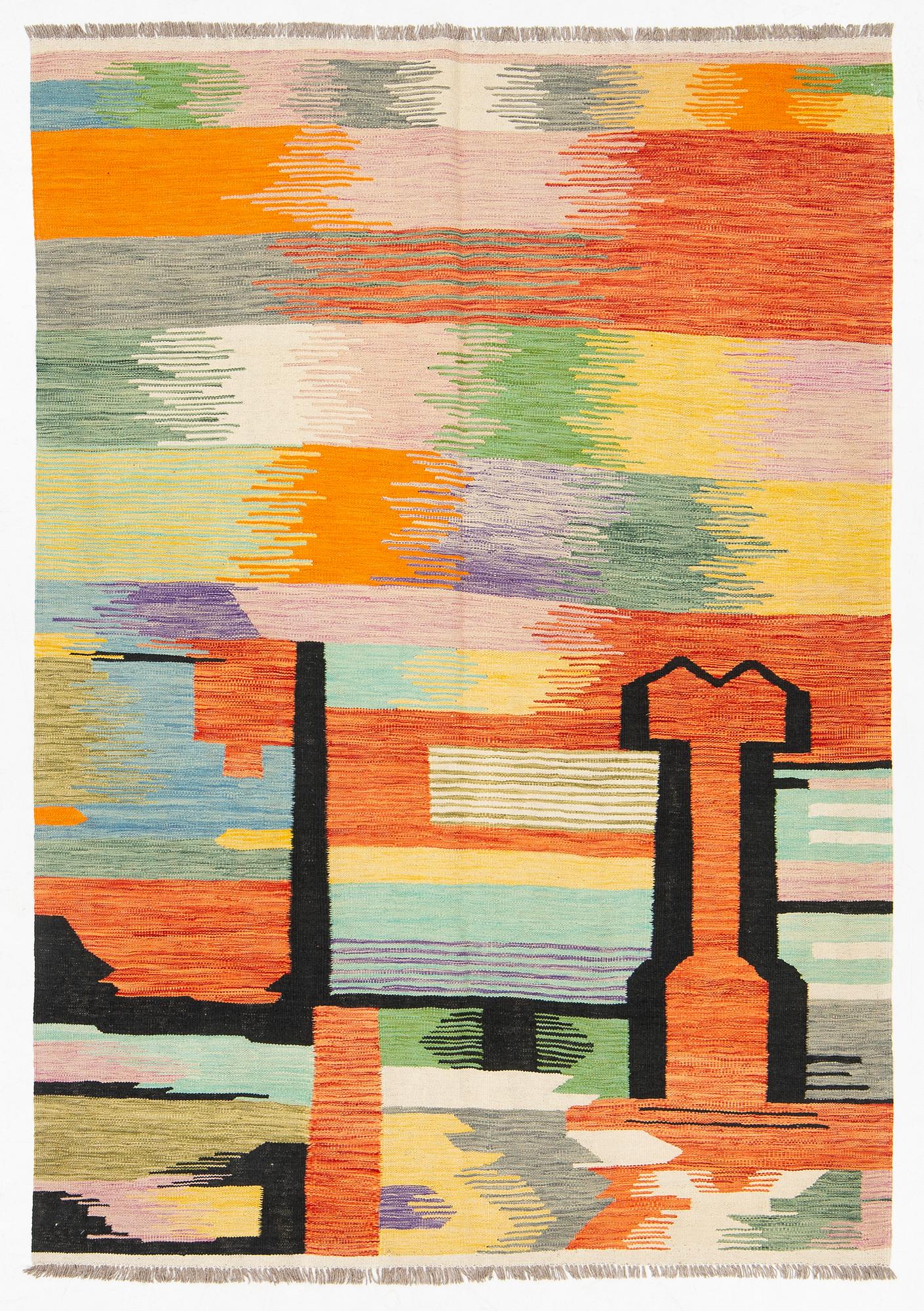 A kilim rug, 247 x 170 cm.