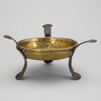 An 18th century brass brazier.