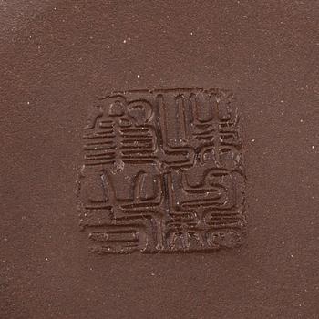 A group of three yixing pots, 20th century.