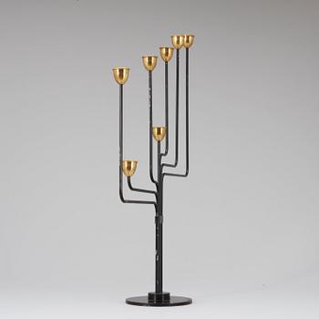 A Piet Hein brass and black lacquered metal candelabrum, 1950's-60's.