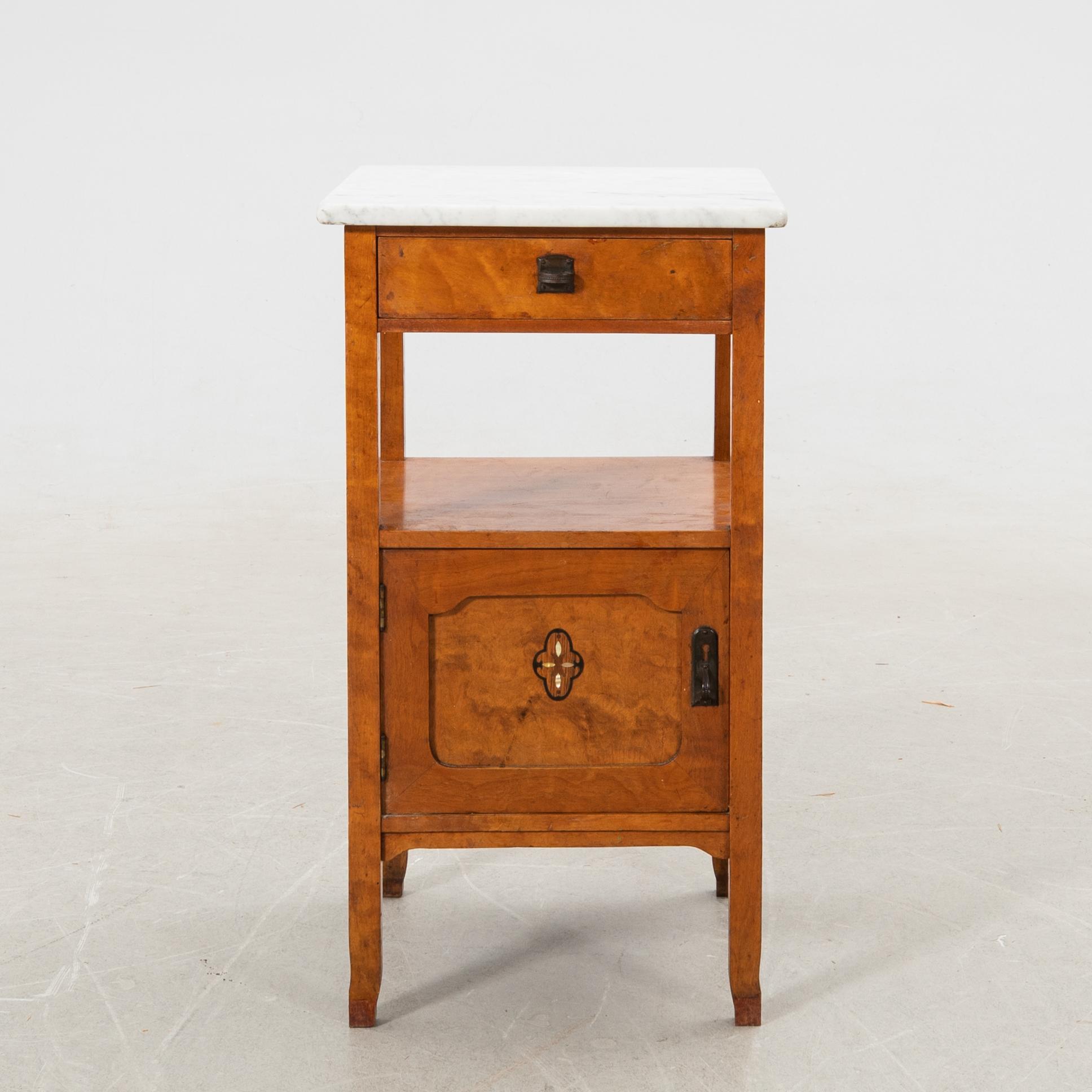 Bedside table with marble top, 20th century.