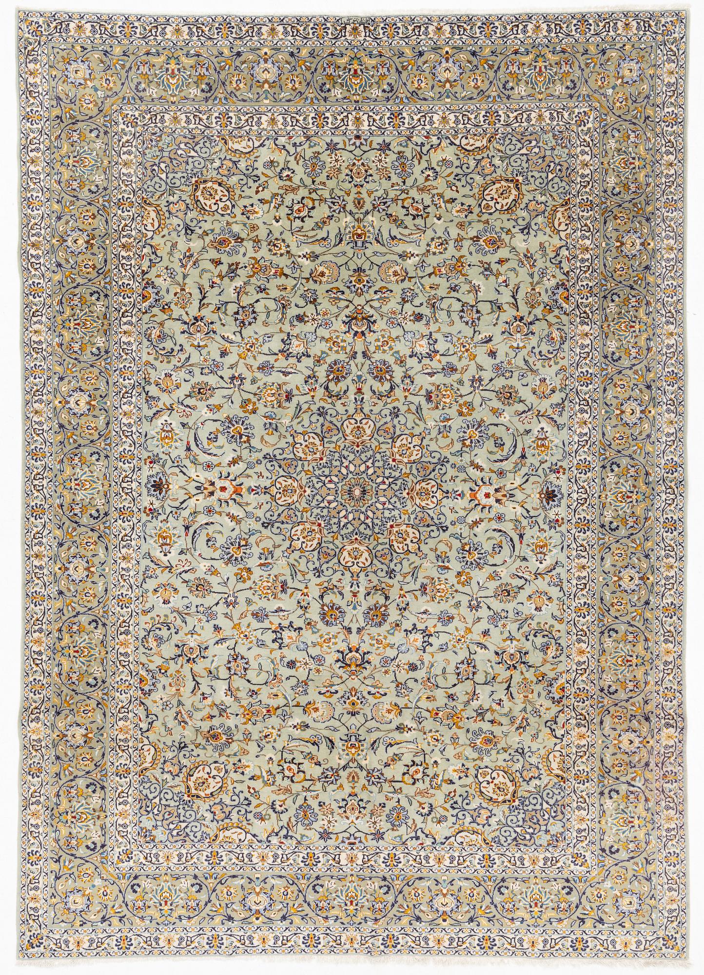 A Keshan carpet, signed, c. 410 x 297 cm.