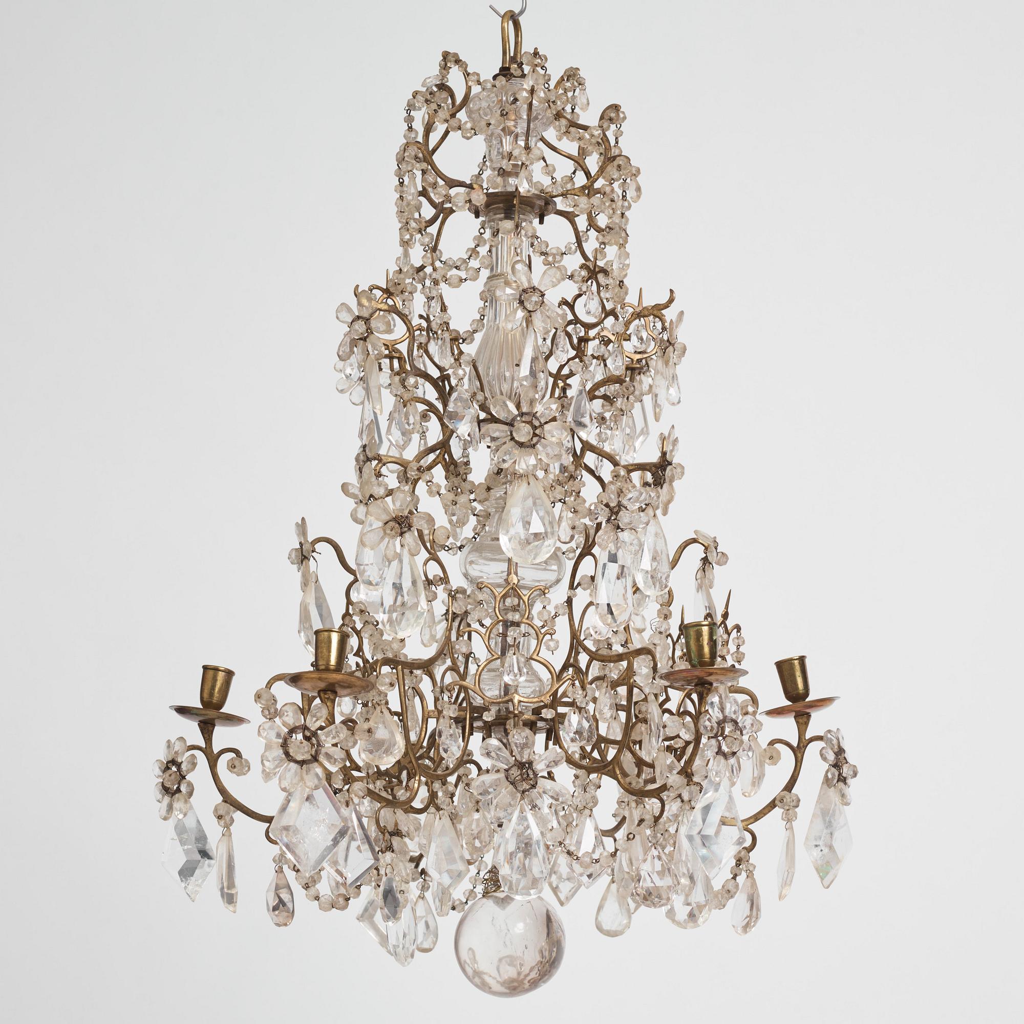 A presumably Italian Baroque and Baroque-style rock crystal and cut-glass six-branch chandelier, 18th century and later.