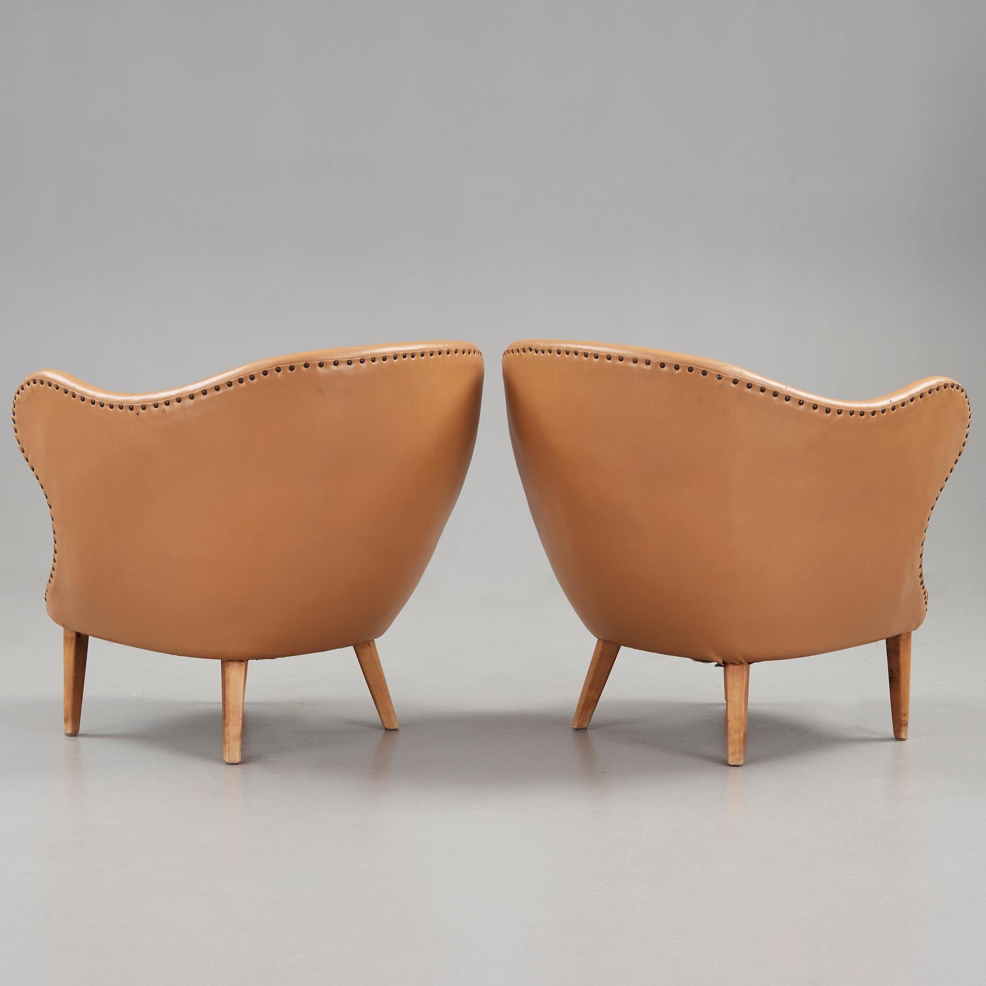 Arne Norell, A pair of Arne Norell 'Tummen/ The Thumb' easy chairs, Gösta Westerbergs Möbler, Stockholm 1950's.