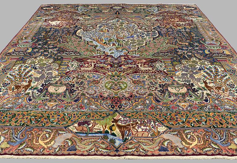 A Kashmar figural carpet. Circa 390 x 300 cm.