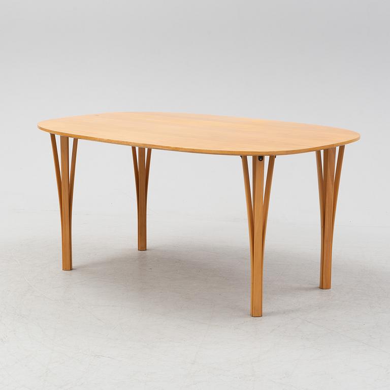 Bruno Mathsson & Piet Hein, a beech tree 'Superellips' dining table, Fritz Hansen, 1983.