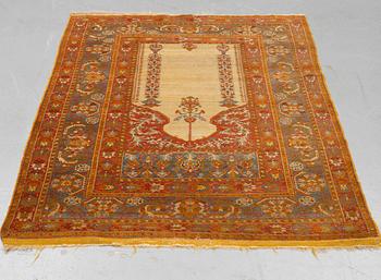 A rug, anique Anatolian, probably  Gördes (Ghiordes), ca 157 x 120 cm.