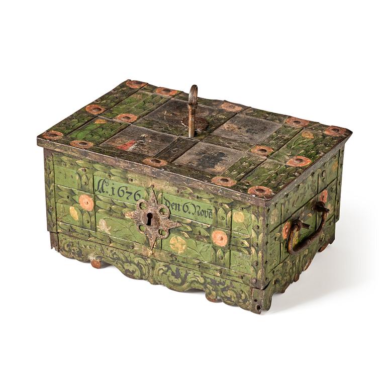 A Baroque South German engraved and polychrome-painted iron and steel strongbox, later part of the 17th century.