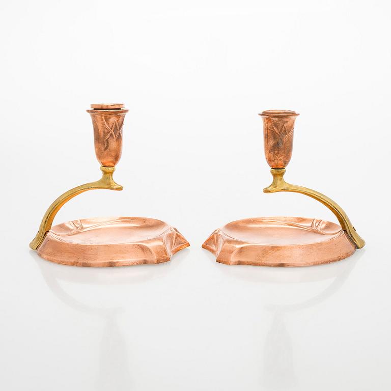 A pair of early 20th century WMF (Württembergische Metallwarenfabrik), candlesticks.