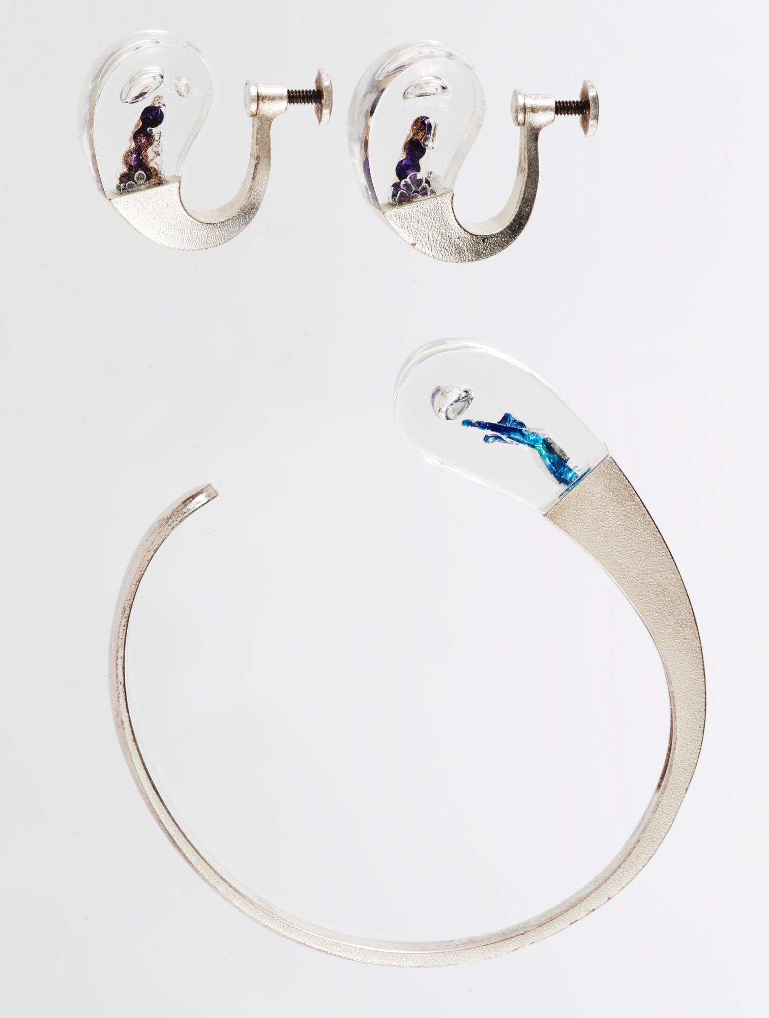 A Björn Weckström bangle and earrings by Lapponia, Finland 1976.