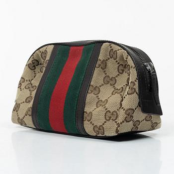 Gucci, bag, "Messenger bag" and toiletry bag.