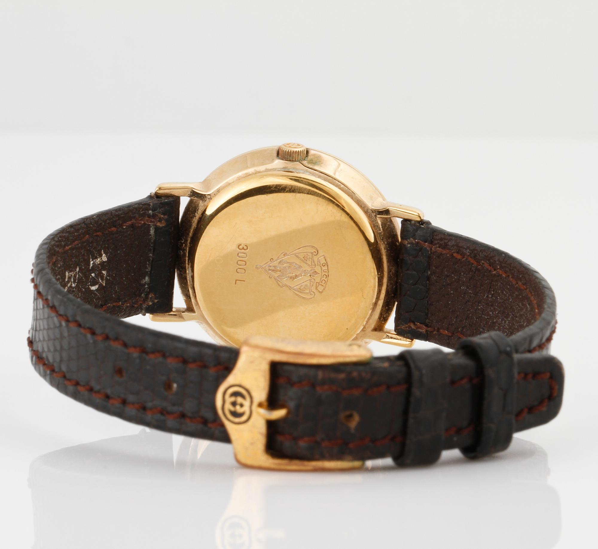 ARMBANDSUR, dam, Gucci.