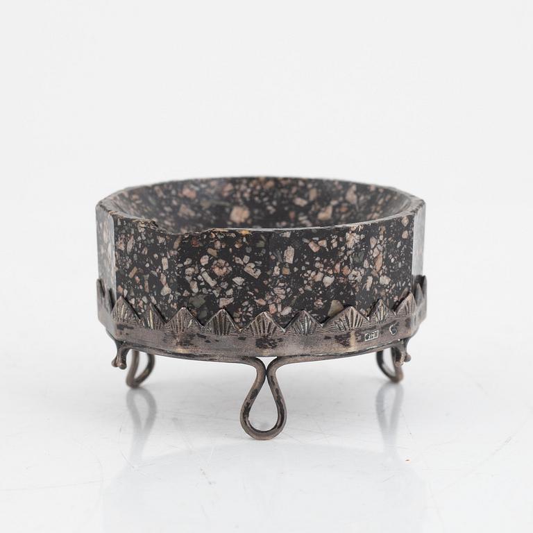 An early 19th century 'Orrlok' porphyry salt with a silver stand,  mark of C. L. Nordström, Uddevalla 1897.