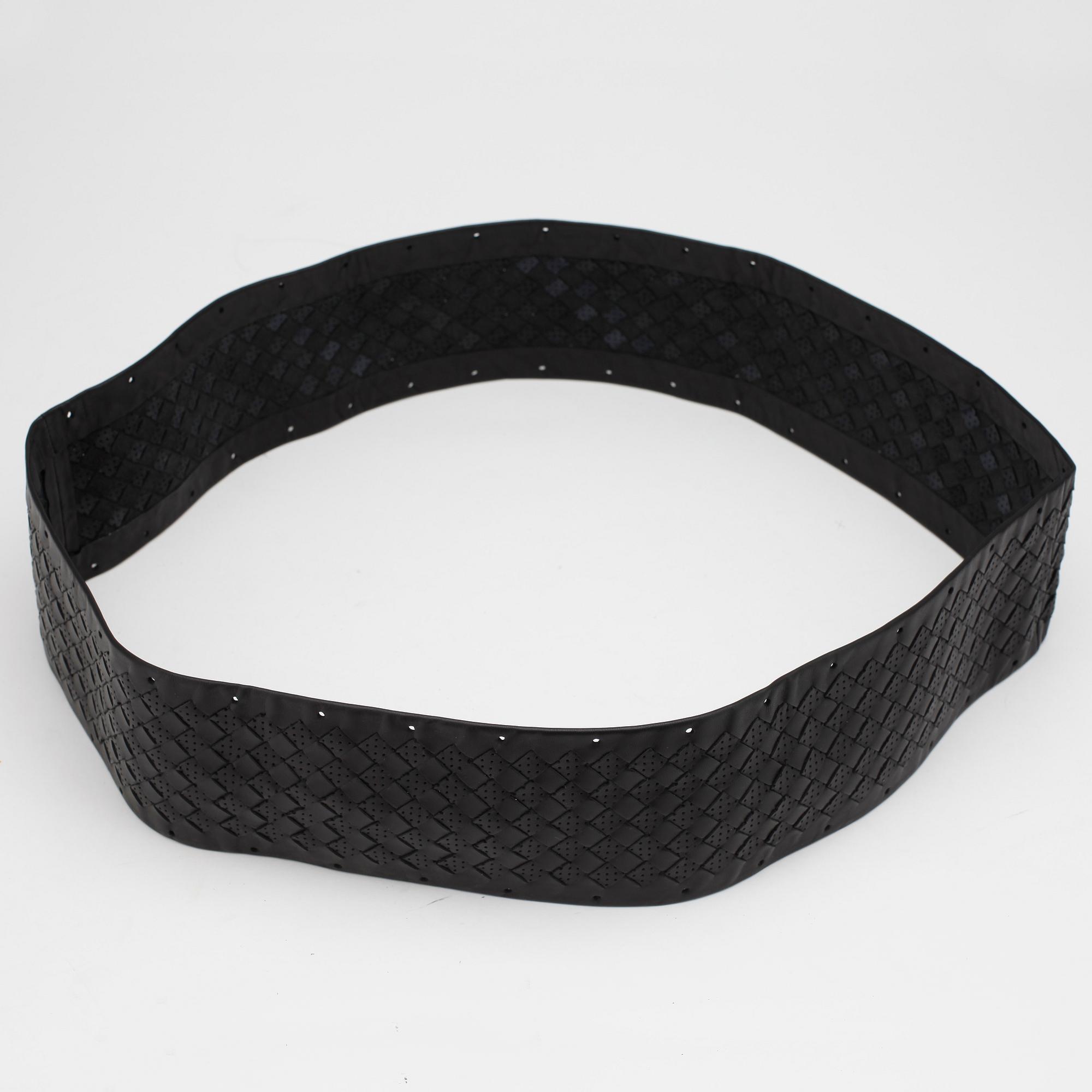 BOTTEGA VENETA, a black leather cover for the steering wheel.