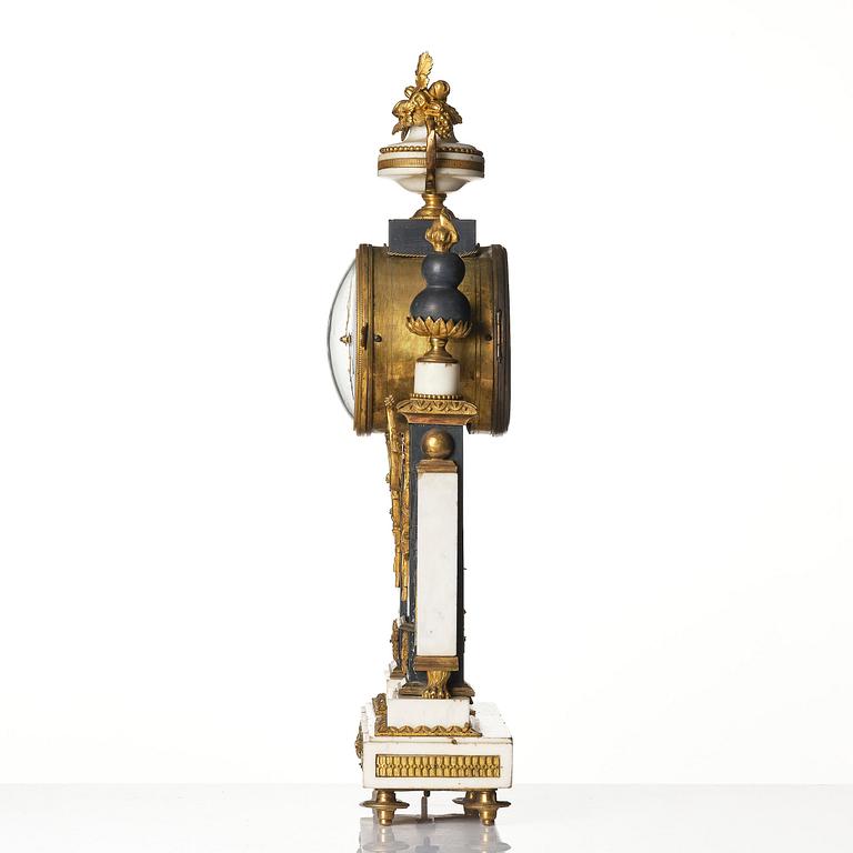 A marble and ormolu Louis XVI portico mantel clock, Paris, late 19th century.