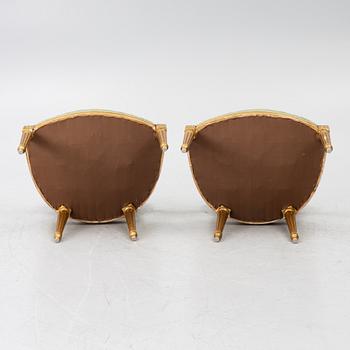 A pair of armchairs, Gustavian style, early 20th century.