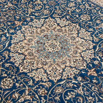 A semi-antique Nain Tusheshk, signed, ca 324 x 223 cm.