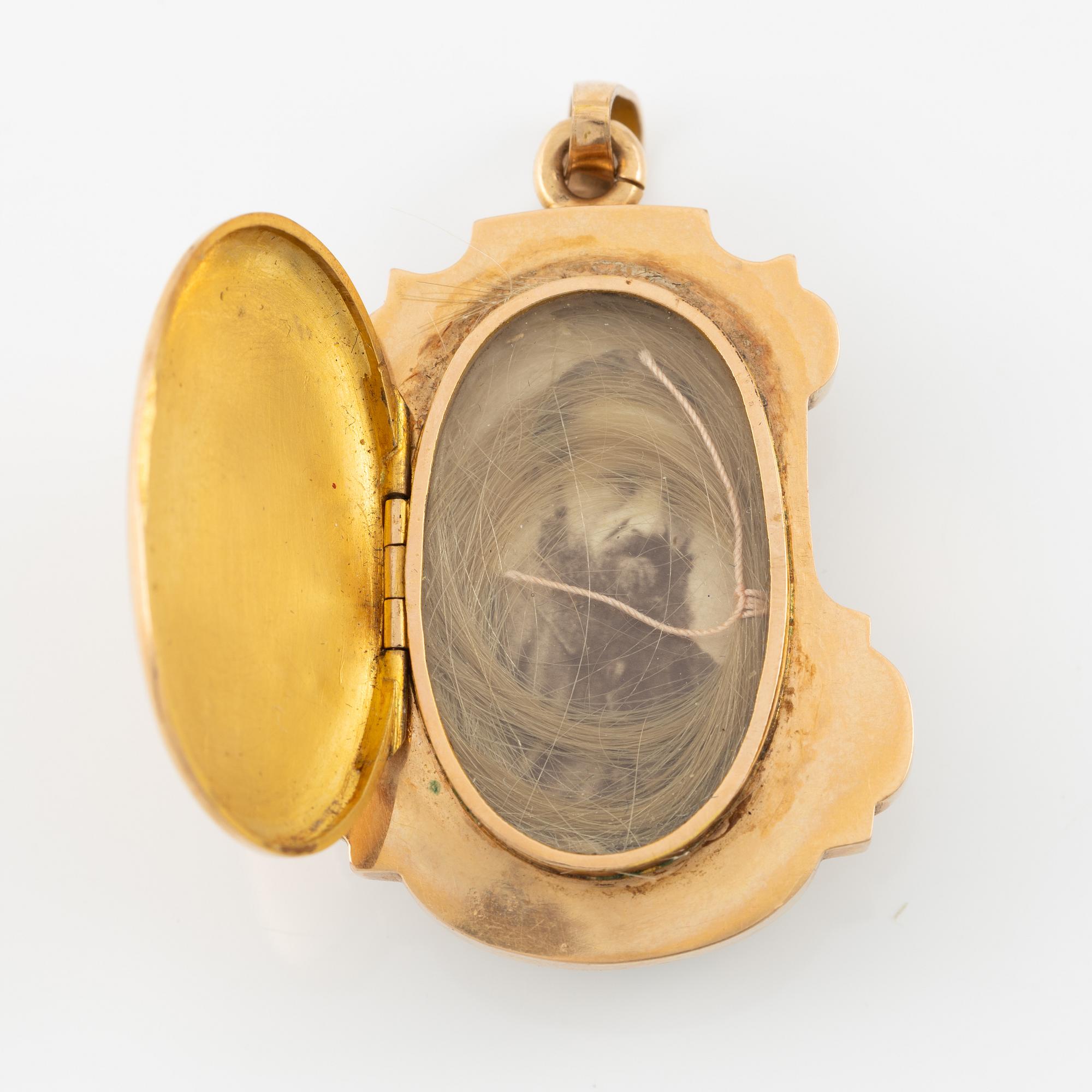 Pendant, 18K gold and silver, with turquoises and pearls. With a hidden compartment.