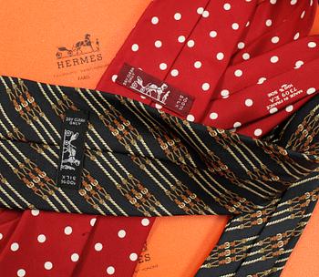 A set of two silk ties by Hermès.