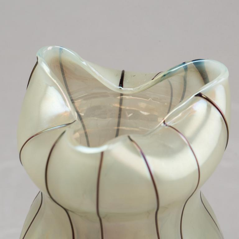 AN ART NOVEAU GLASS VASE.