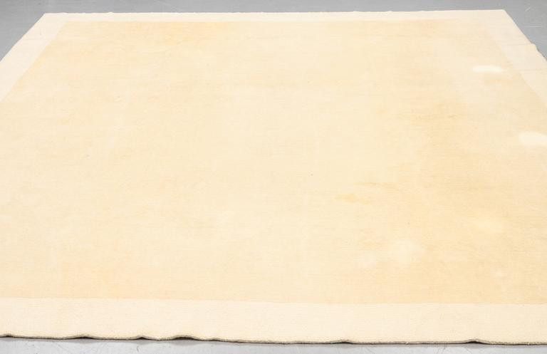 A carpet, knotted and loomed, ca 328 x 347 cm.