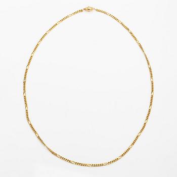 An 18K gold neckalce with stones. Erling Kaj Oy Ab, Helsinki 1977.